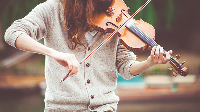 Folk musician - violin - photo by Clem Onojeghuo on Unsplash