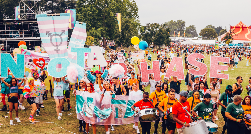 Mighty Hoopla with Not A Phase placards held